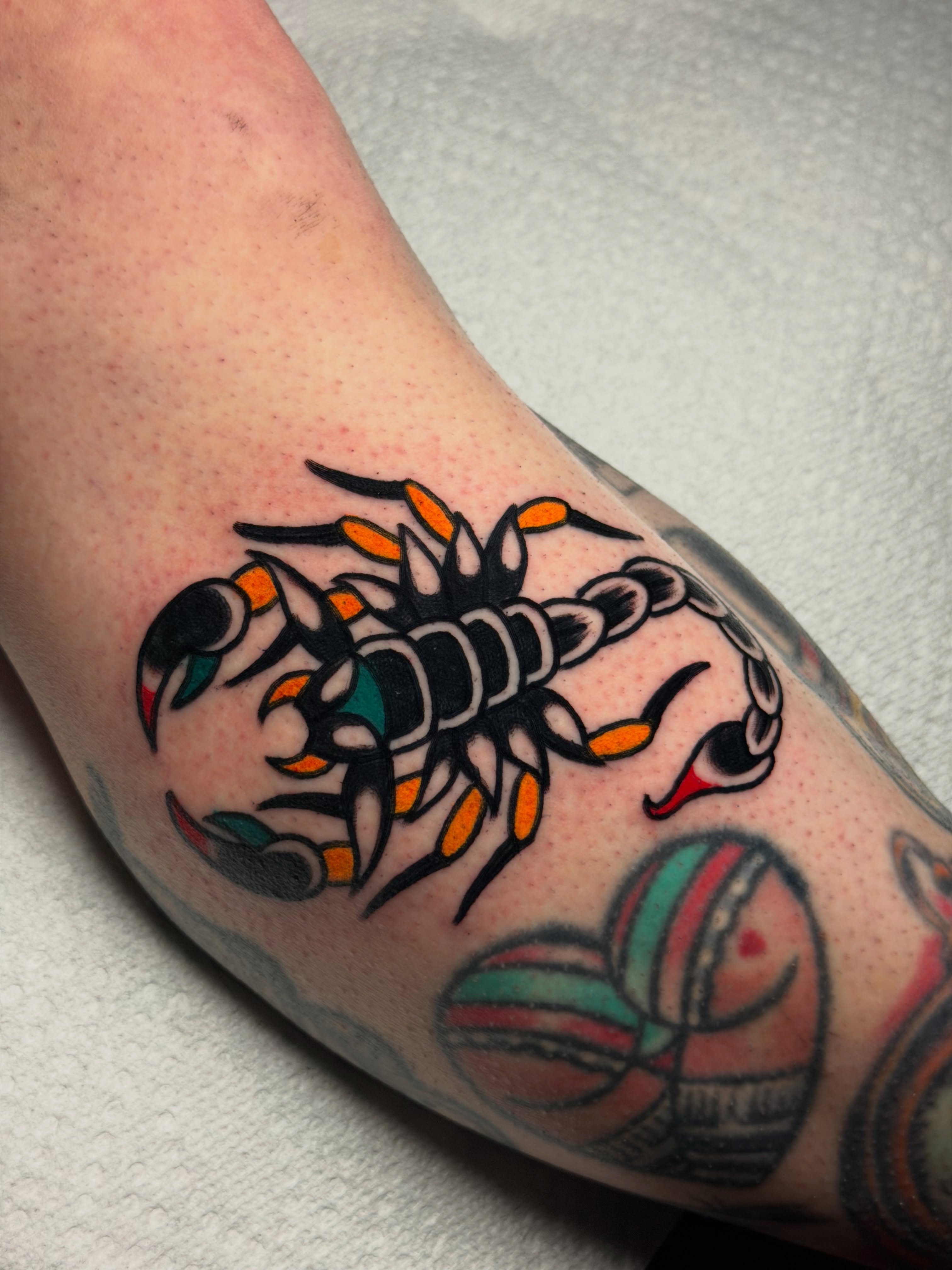 Scorpion American traditional tattoo on the forearm by Kyle Dean Traditional Tattoo Artist