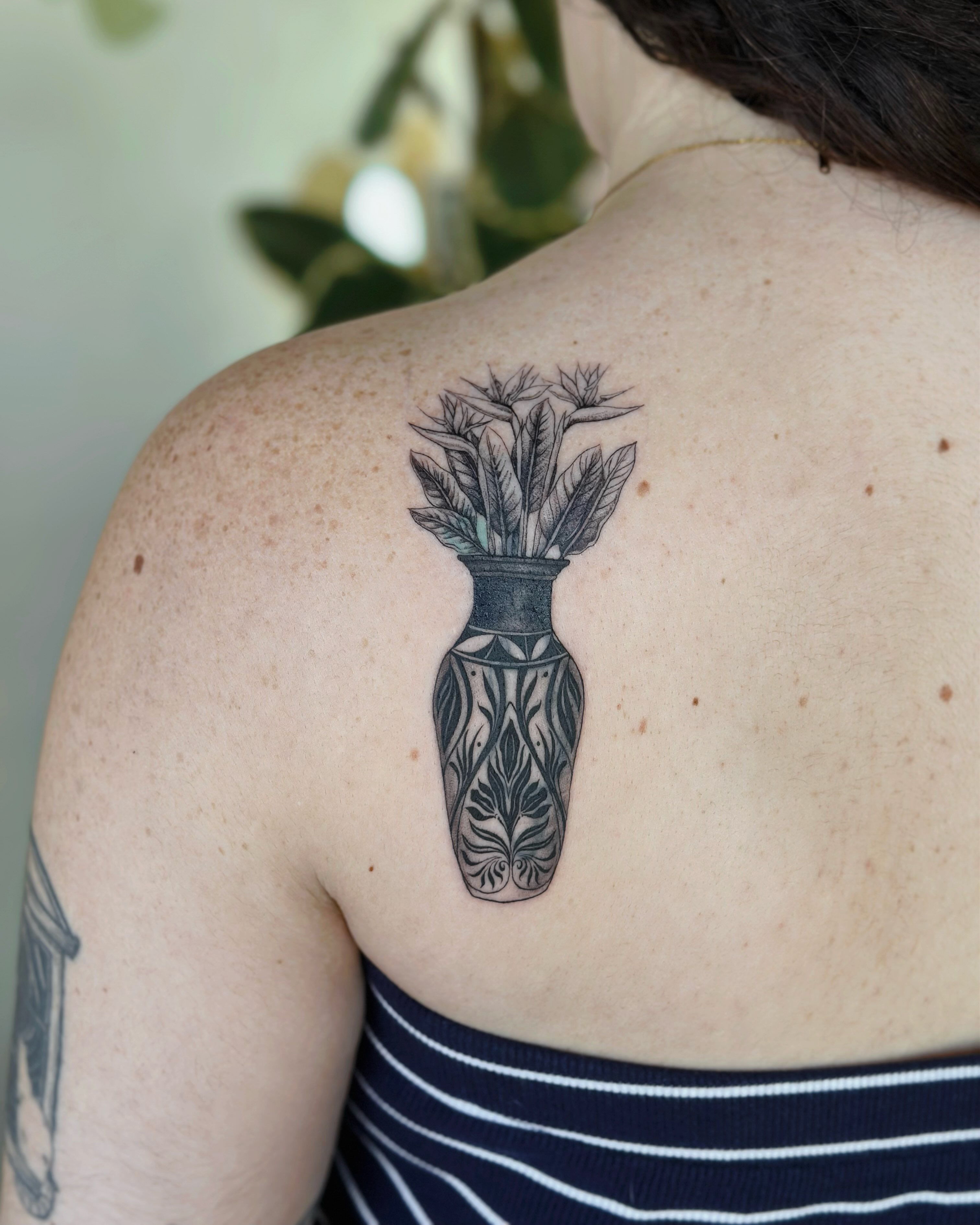 Vase with flowers black and grey tattoo on the shoulder by 𝗠𝗶𝗱𝗻𝗶𝗴𝗵𝘁 〰️ 𝕄𝕠𝕠𝕟𝕝𝕚𝕘𝕙𝕥