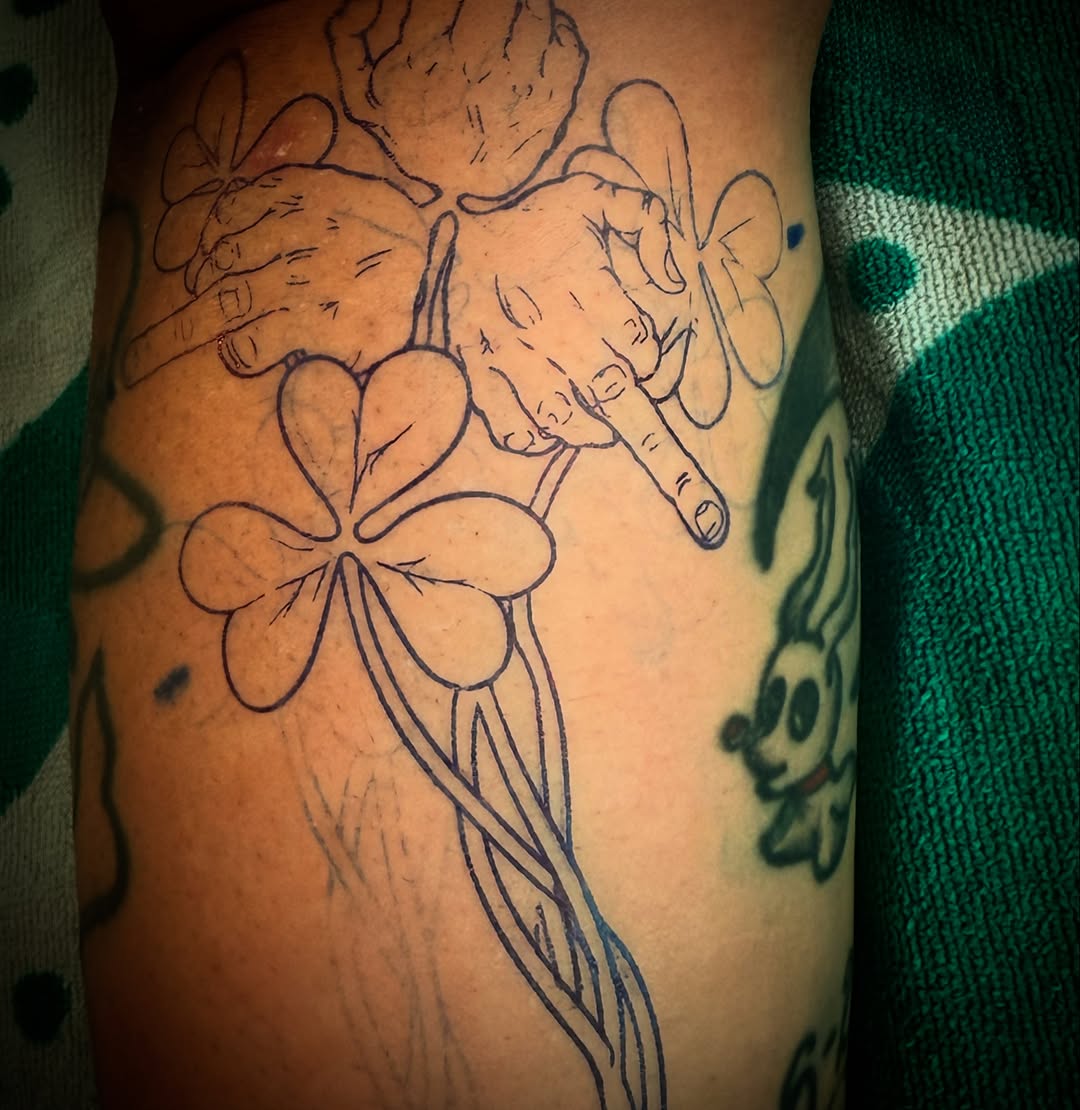 Hands and clover tattoo on the forearm by RVA Tattoo Artist