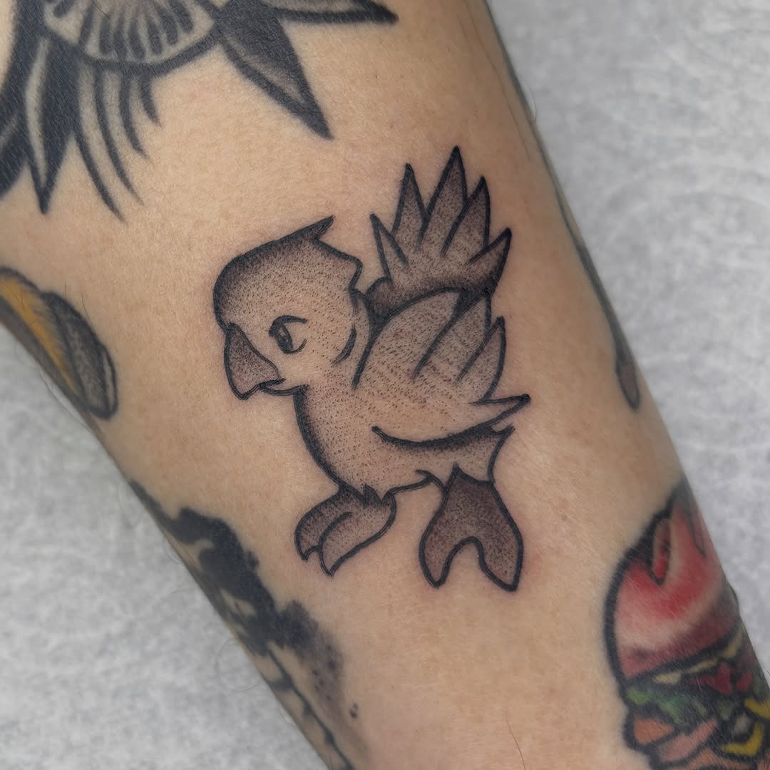 Chocobo bird new school tattoo on the forearm by Amelia Rose, Los Angeles, California