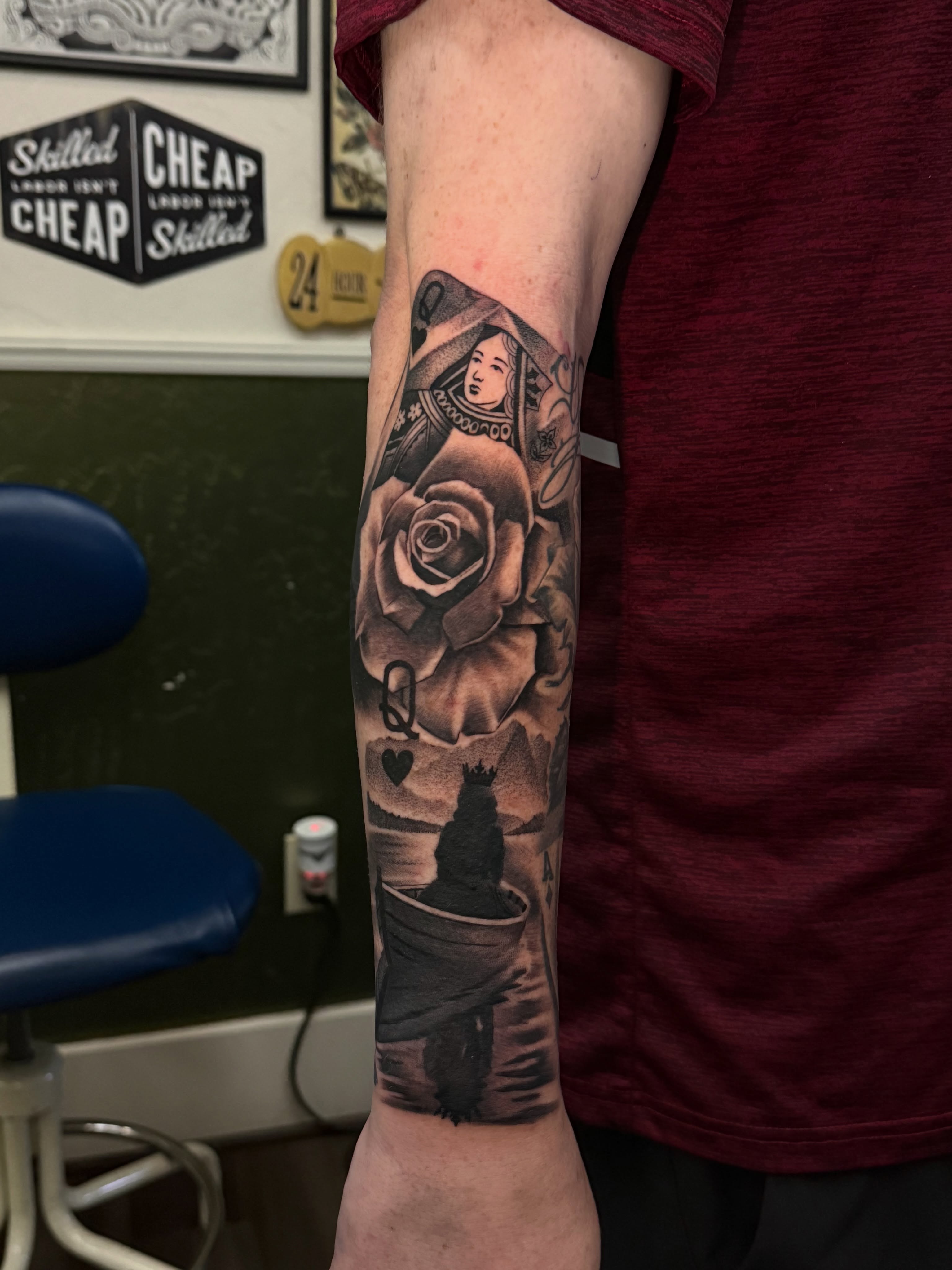 Queen of hearts and rose realism tattoo on the forearm by “Gonzo
