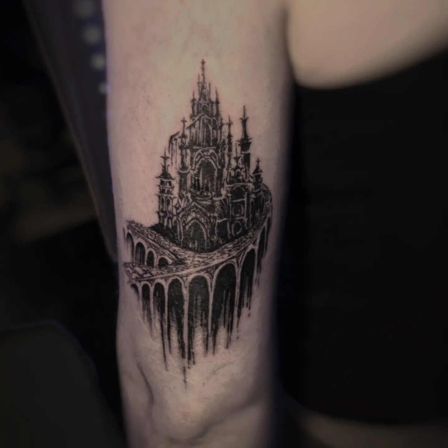 Castle black and grey tattoo on the forearm by Bek Artz