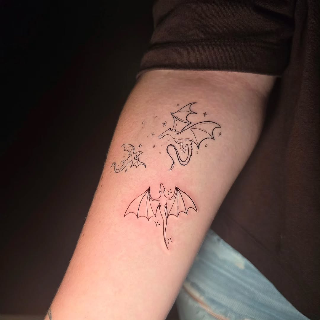 Three dragons fine line tattoo on the forearm by Scar