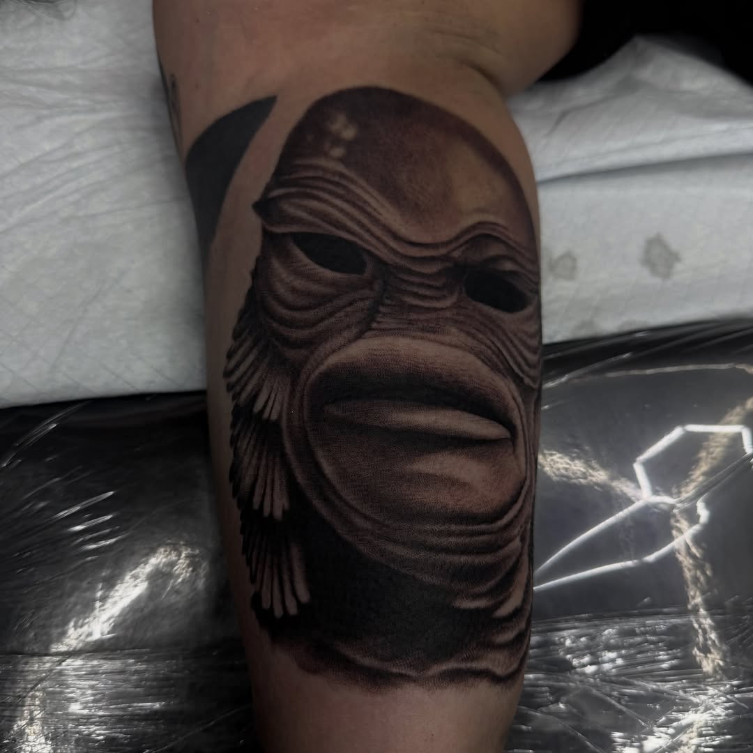 Creature from the Black Lagoon portrait realism tattoo on the forearm by Nick Campbell