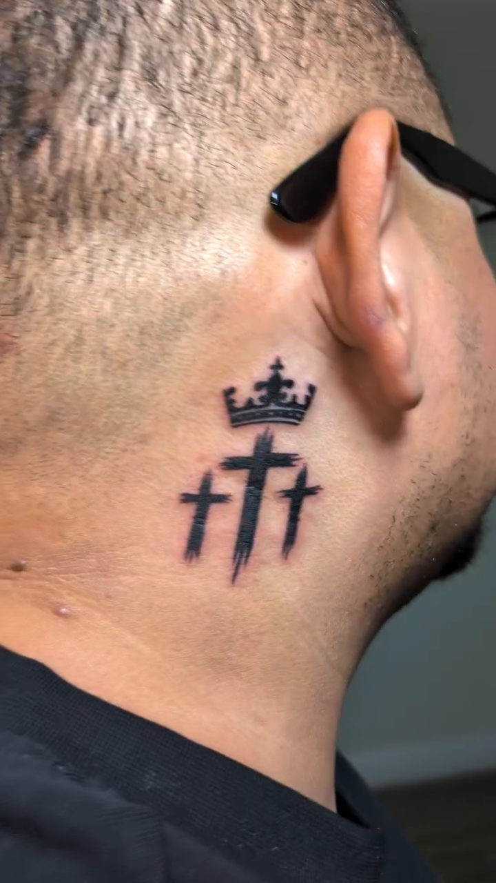Crown and three crosses tattoo on the neck by Tony