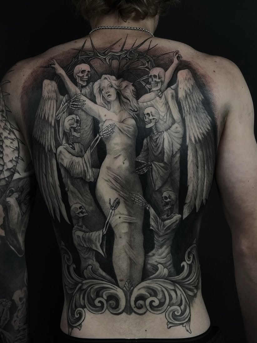 Naked woman surrounded by skeletal figures dark realism tattoo on the back by Noah A Rasmus