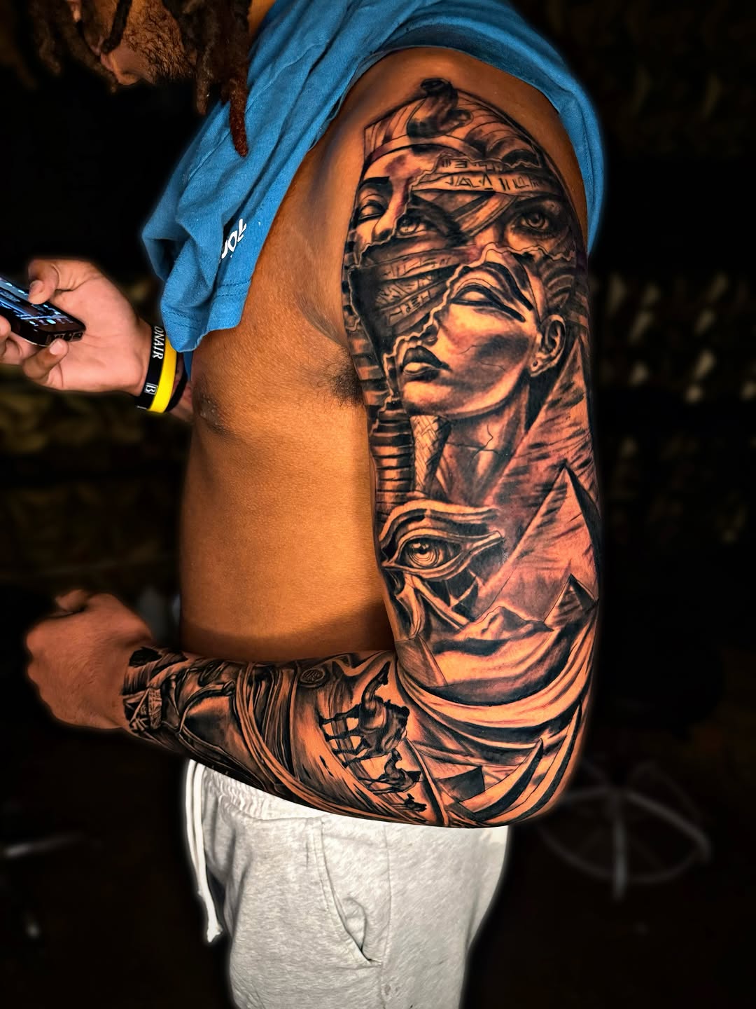 Egyptian pharaoh and pyramids surrealism tattoo on the upper arm by Dallas Tattoo Artist📍