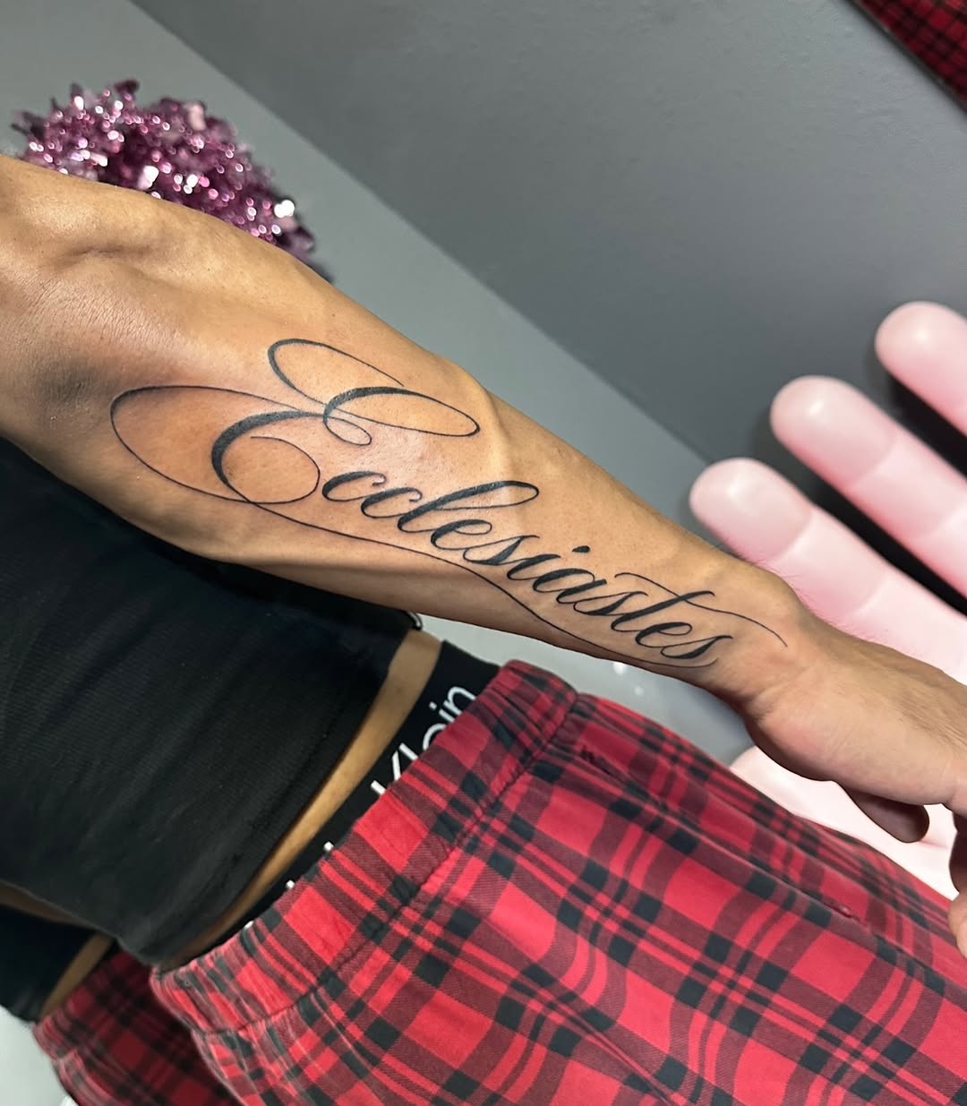 Ecclesiastes script lettering lettering tattoo on the forearm by Lupita Ink