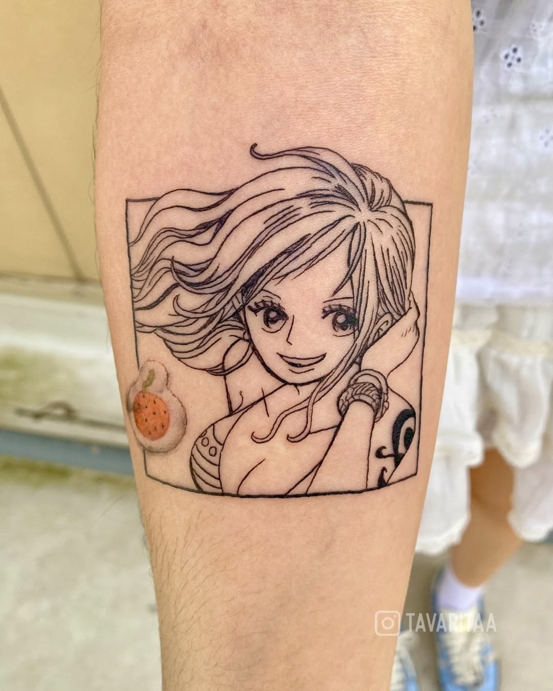 Nami from One Piece anime tattoo on the forearm by Tavarita