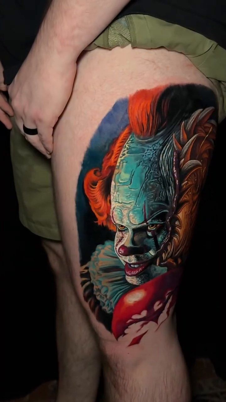 Pennywise the Clown realism tattoo on the upper arm by Sean Foy
