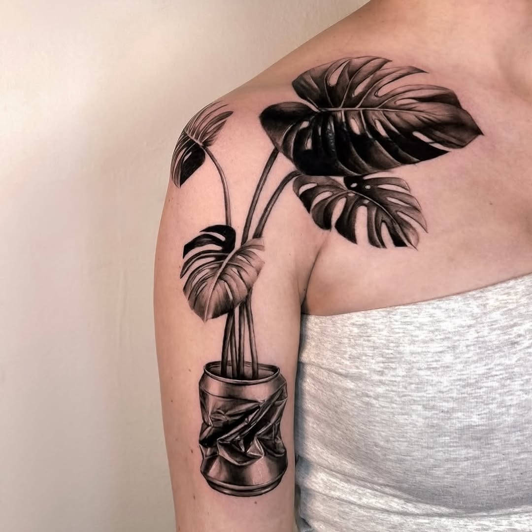 Monstera plant in a crushed can sketch tattoo on the shoulder by Longtea
