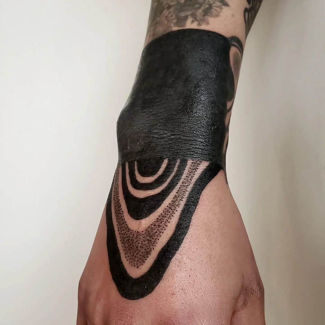 Tattoo by @aqua.suntattoos — blackwork, geometric