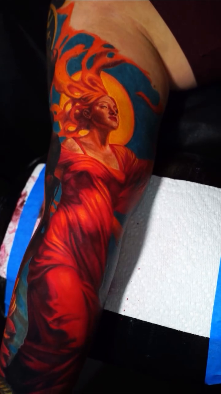 Realism tattoo on the upper arm by Nate
