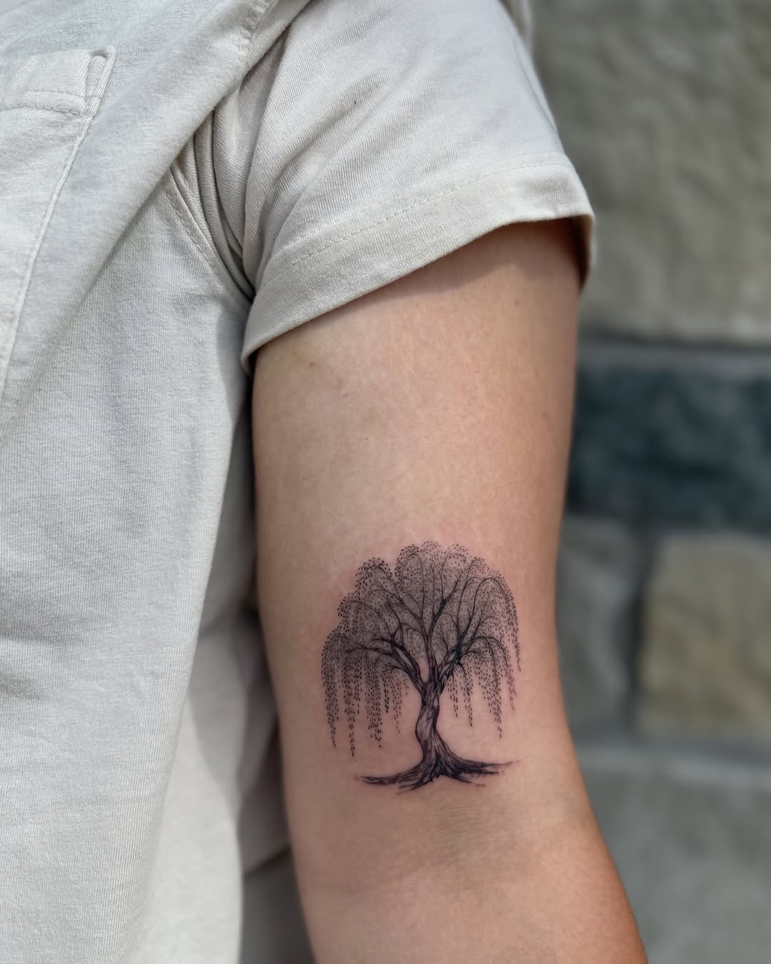 Weeping willow tree watercolor tattoo on the forearm by Fineline Tattoos DFW