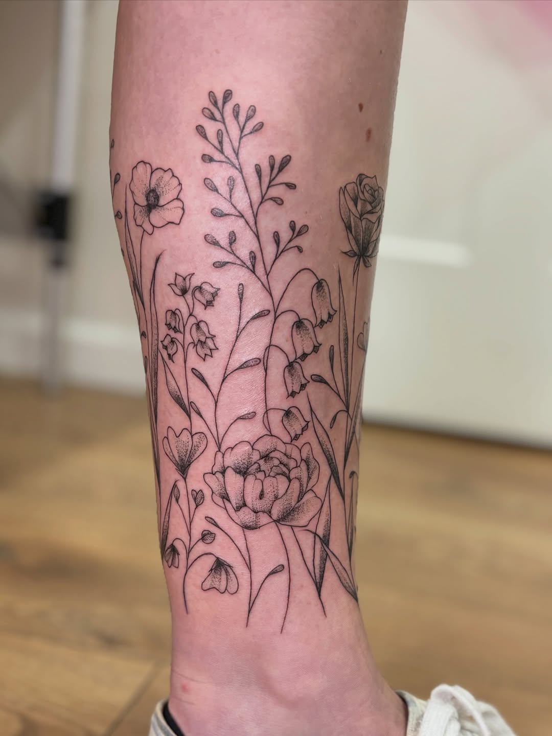 Tattoo by @athenaartistrytattoostudio — fine_line, black_and_grey