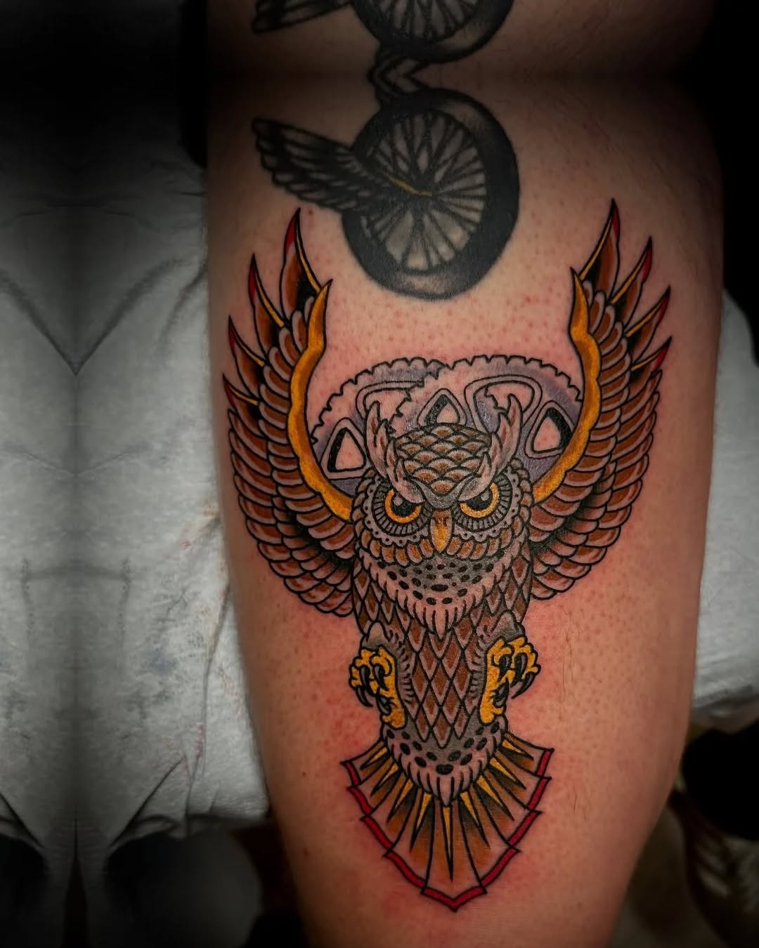 Owl with spread wings American traditional tattoo on the thigh by @jose.phinelynch