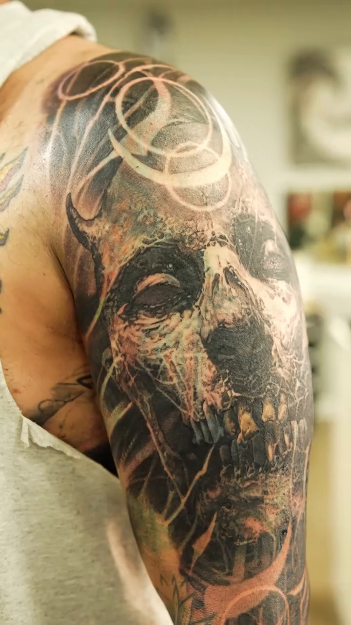 Tattoo by @robbylatos — dark_realism, black_and_grey