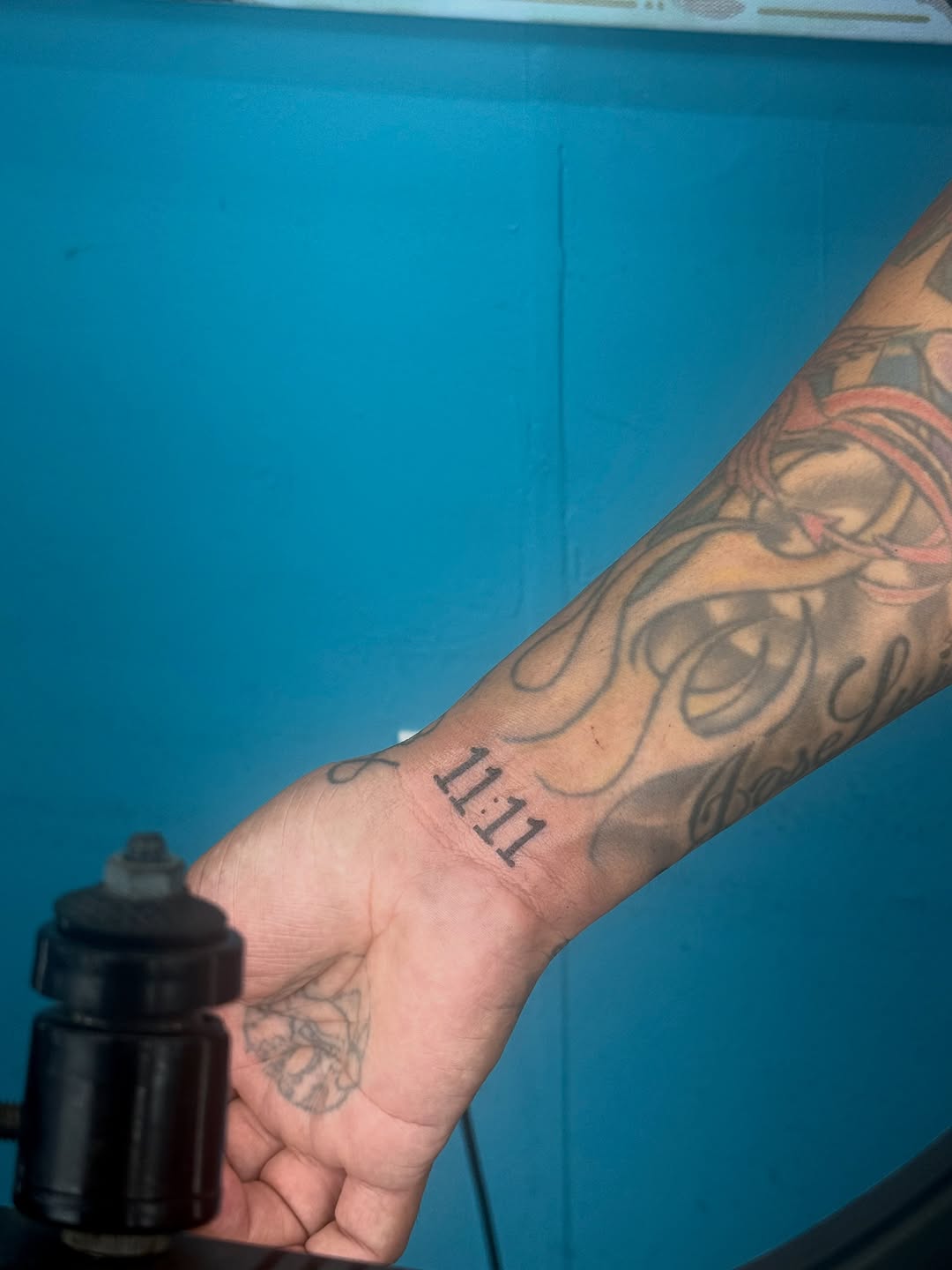 Numbers 11:11 tattoo on the forearm by ⠀Greave