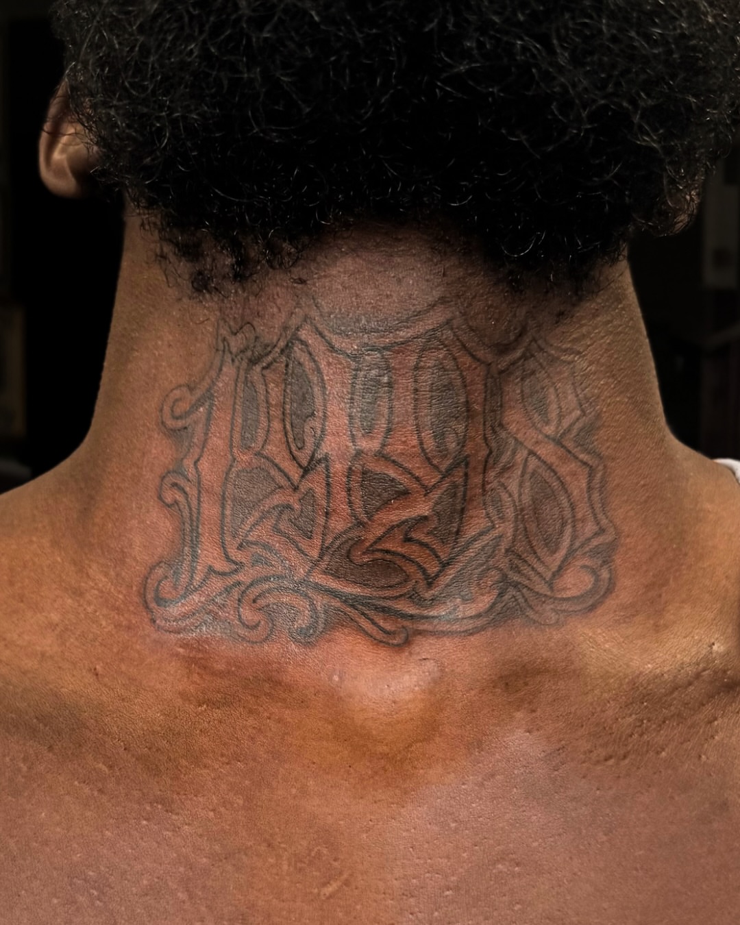 Lettering lettering script tattoo on the neck by Juan Pablo