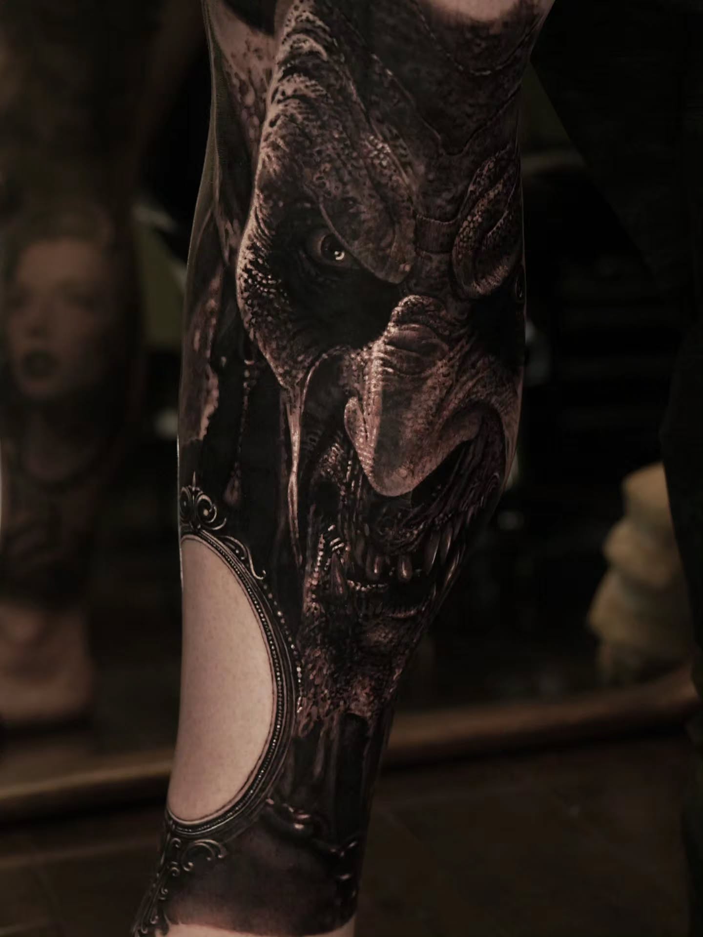 Demon head realism tattoo on the forearm by Owen Paulls