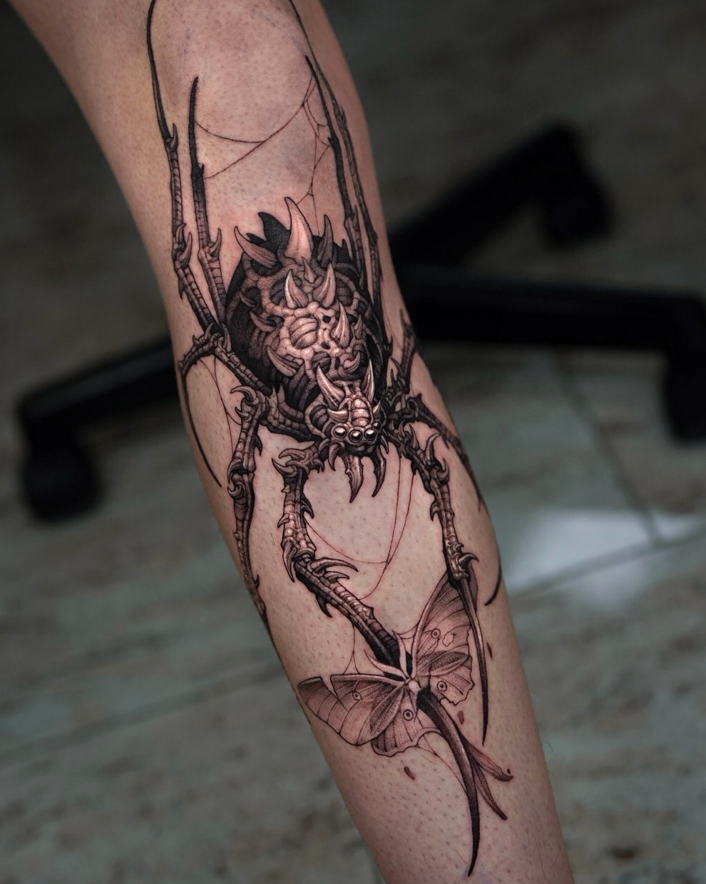 Tattoo by @apso_tattoo — dark_realism, black_and_grey