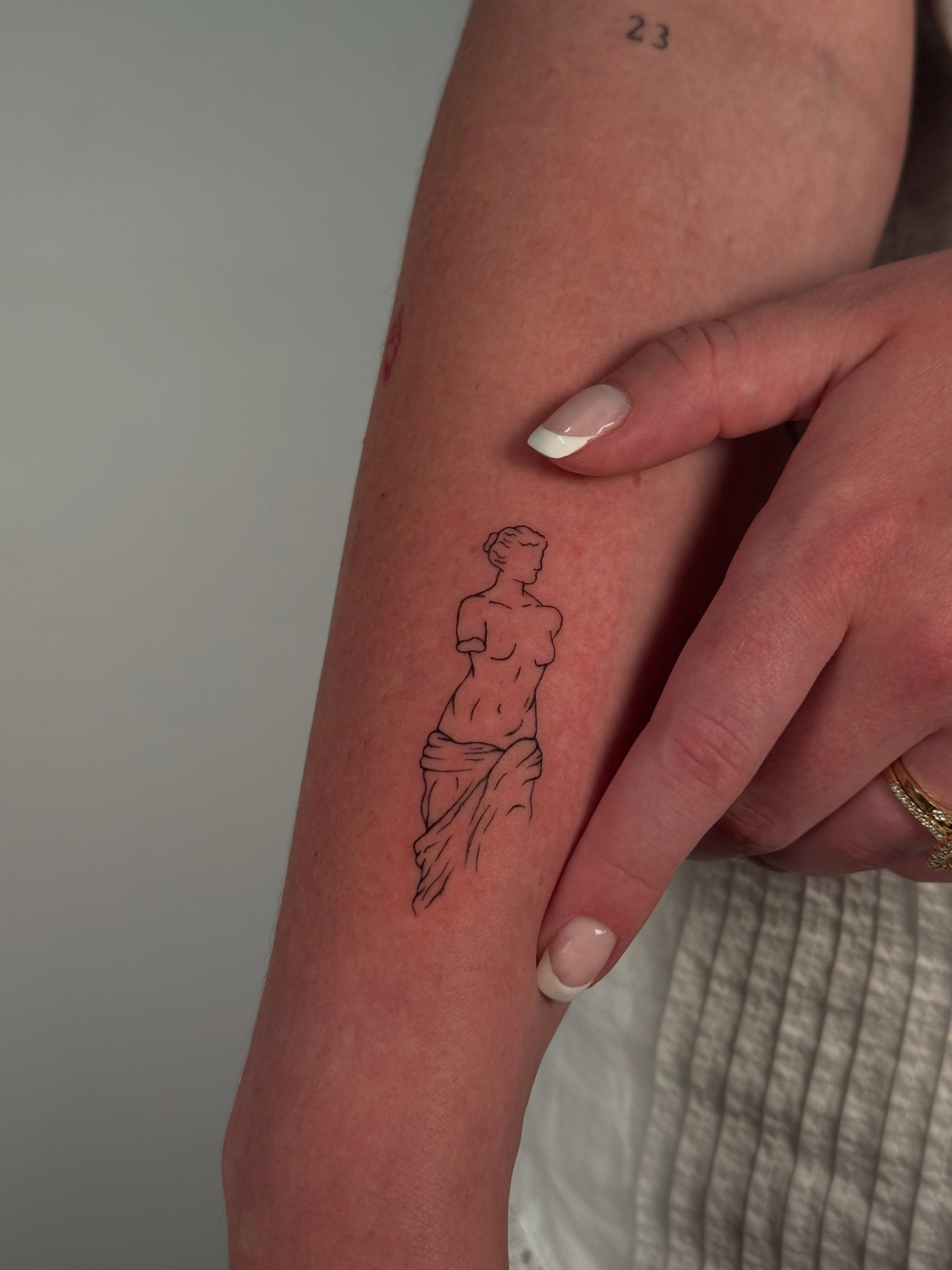 Statue of woman black and grey tattoo on the forearm by Jules Ink ⋆ Fineline Tattoo