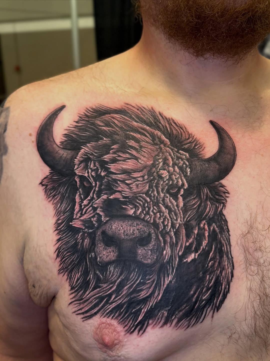 Bison head realism tattoo on the chest by Zeninkz
