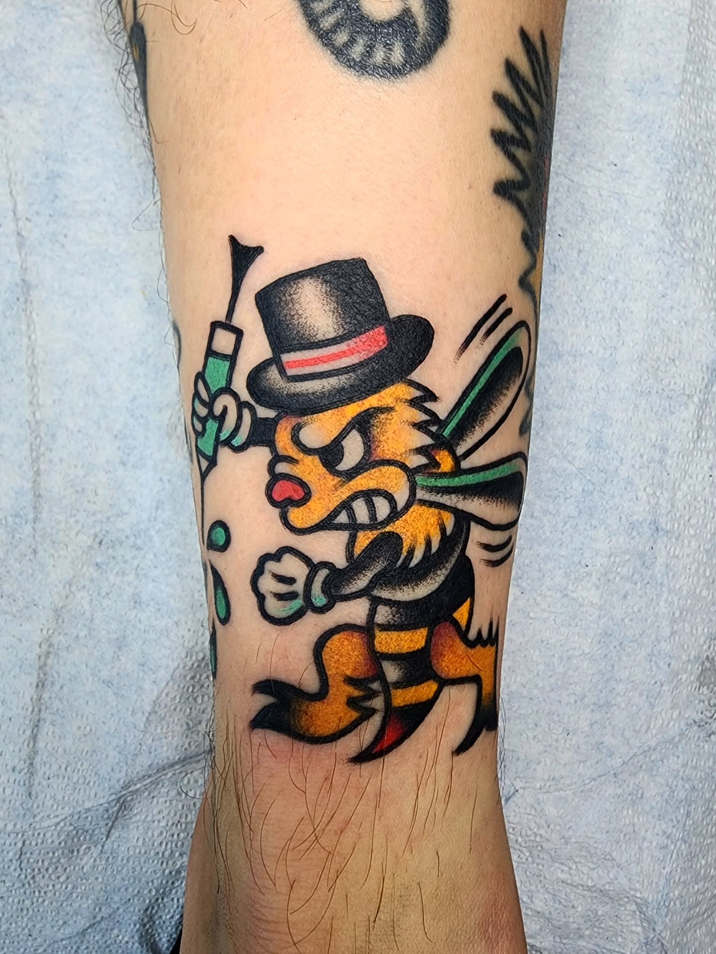 Bee American traditional tattoo on the forearm by πππππ