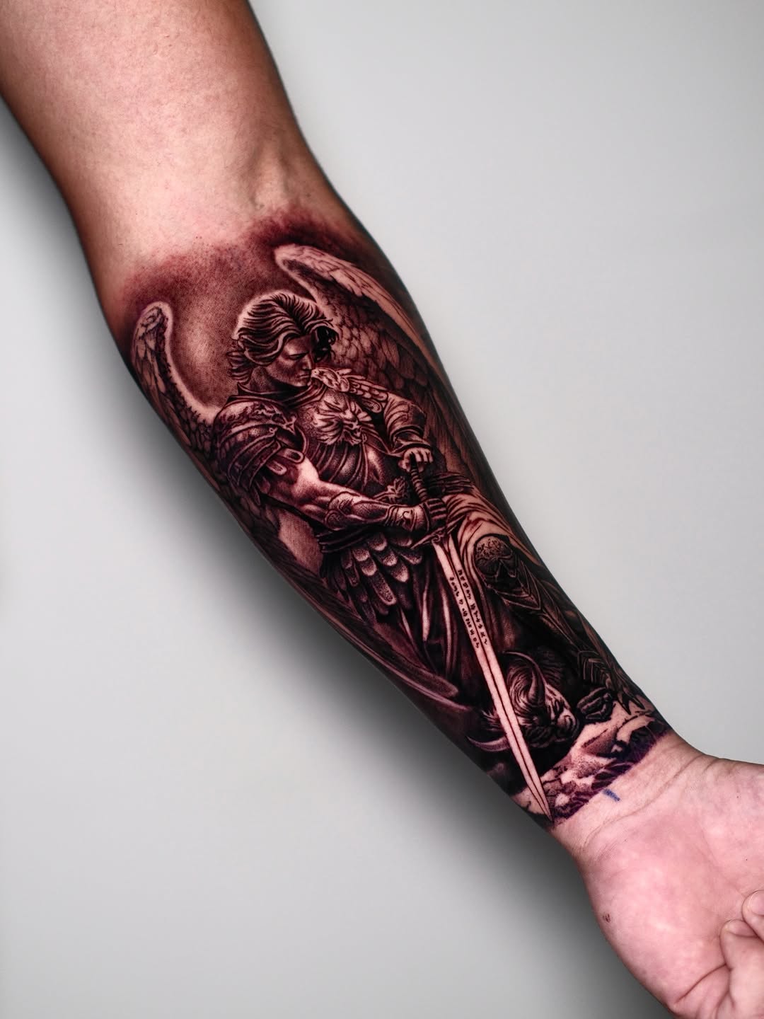 Angel with sword realism tattoo on the forearm by Dallas tattoo artist