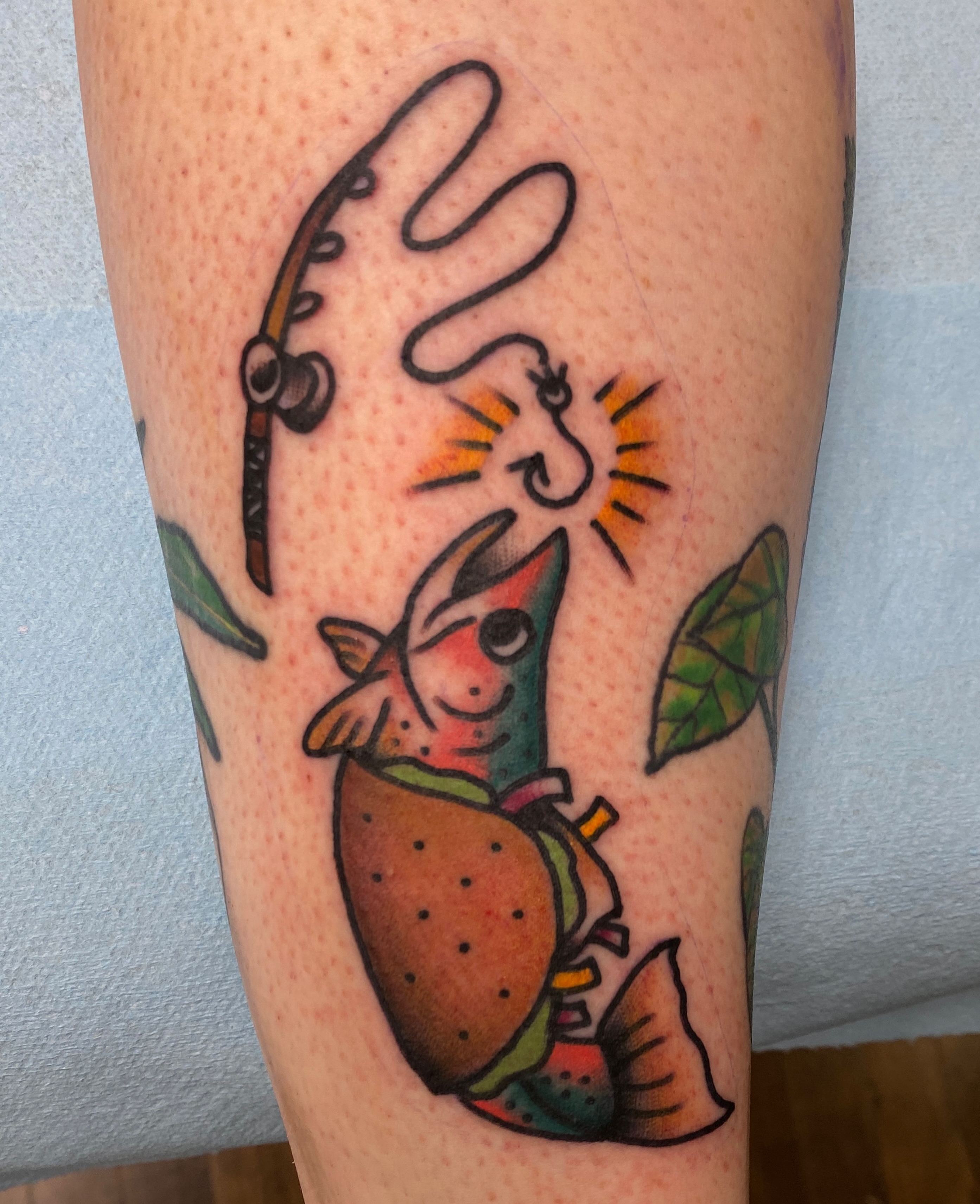Fish and burger American traditional tattoo on the forearm by Marcos🇩🇴