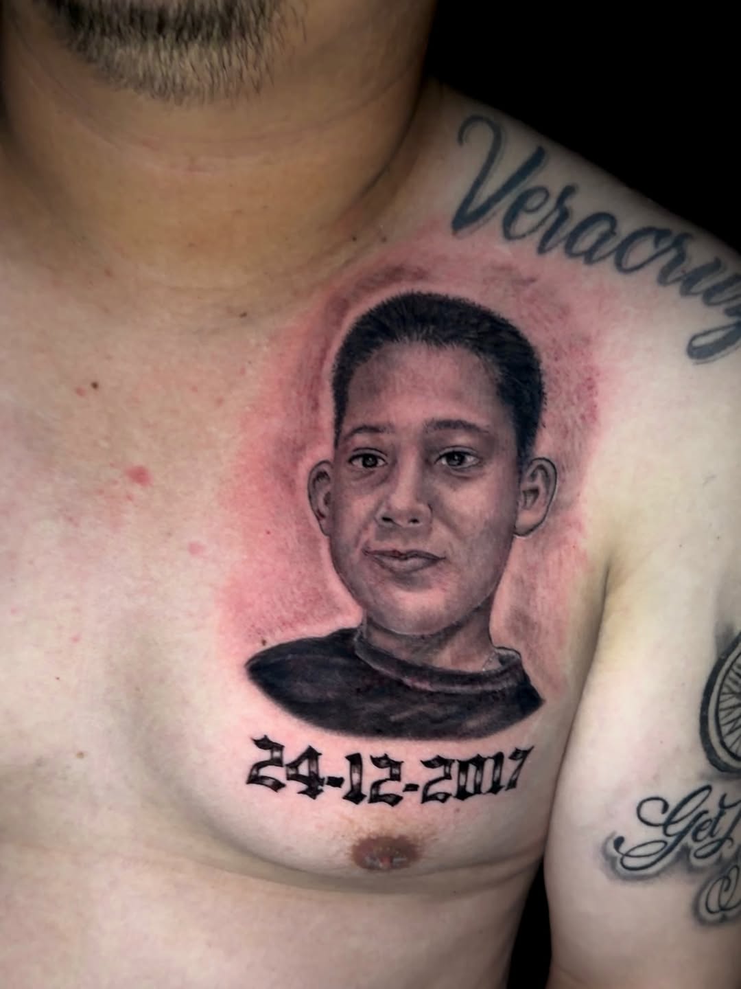 Chicano tattoo on the chest by Junior Sanchez Dfw
