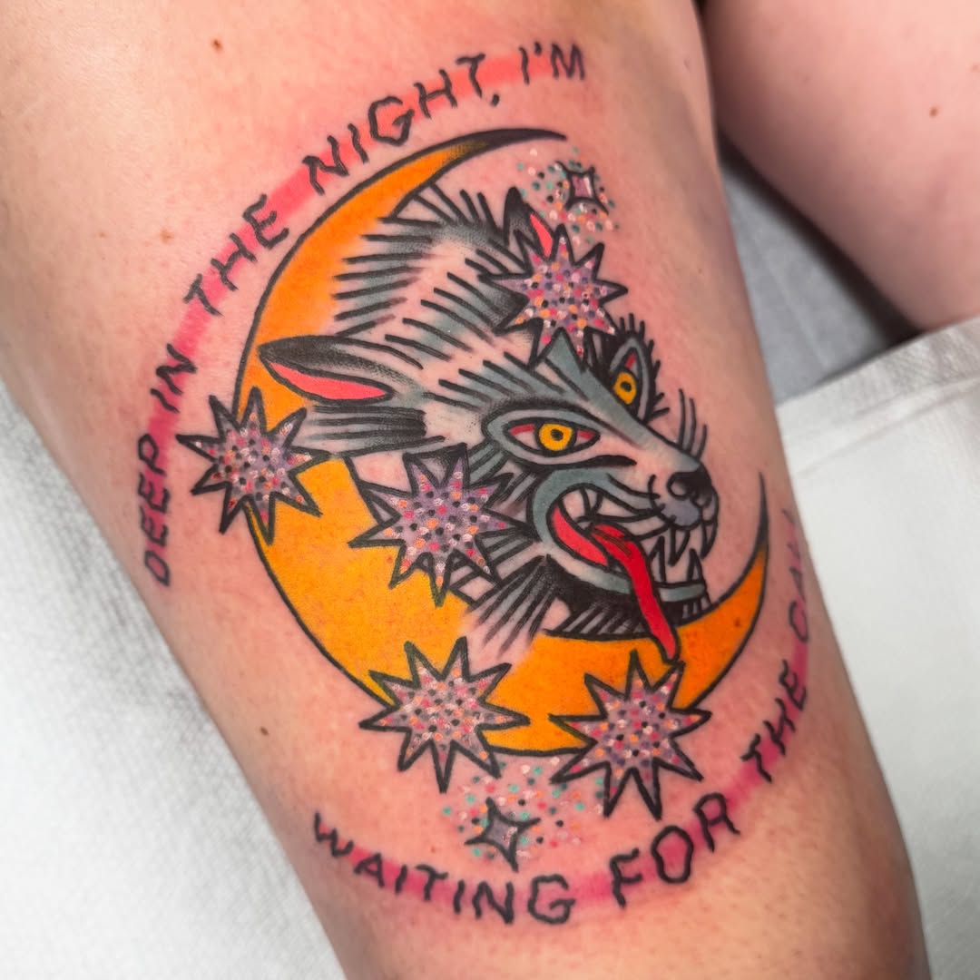 Wolf and moon American traditional tattoo on the forearm by Kurt Brecheis Jr., Malvern, Pennsylvania
