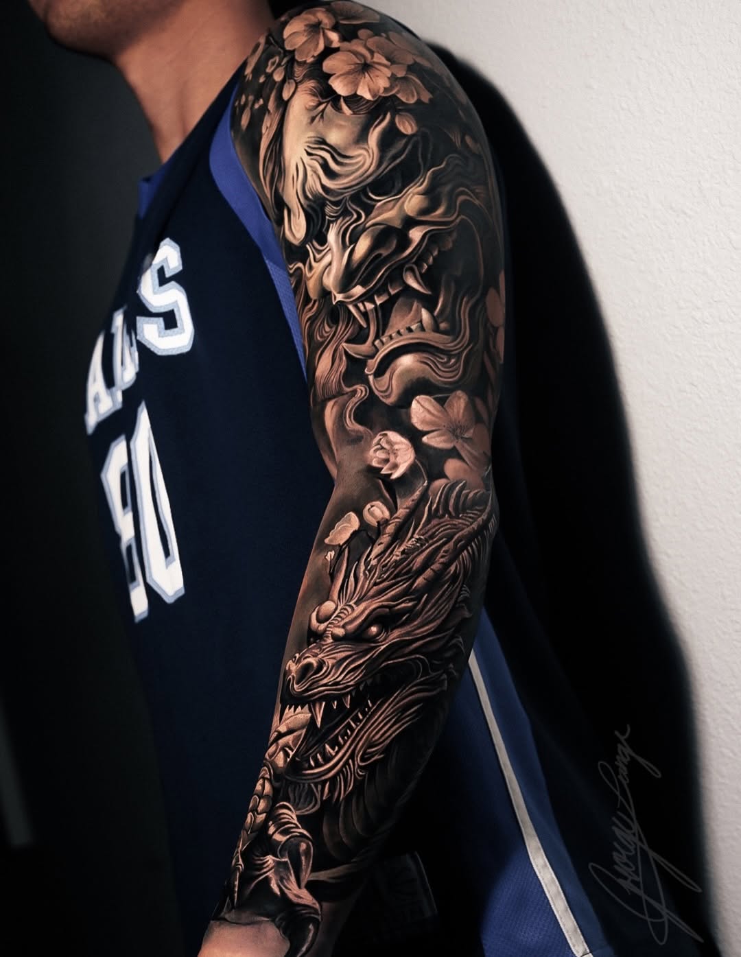 Oni mask and dragon Japanese tattoo on the forearm by George Lange
