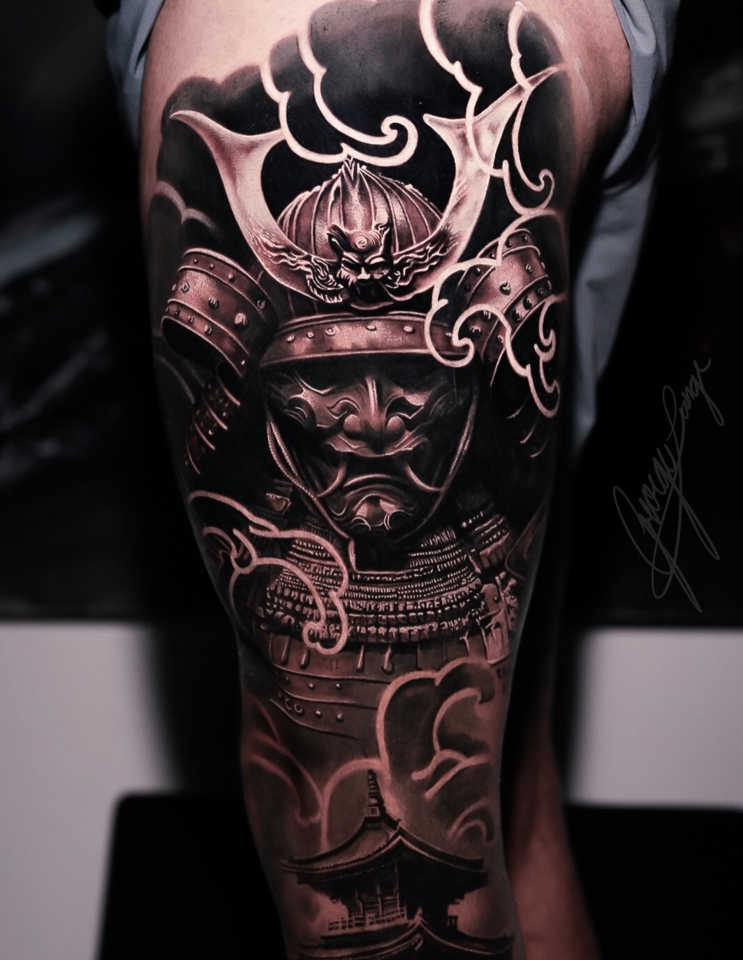 Samurai armor and pagoda Japanese tattoo on the forearm by George Lange