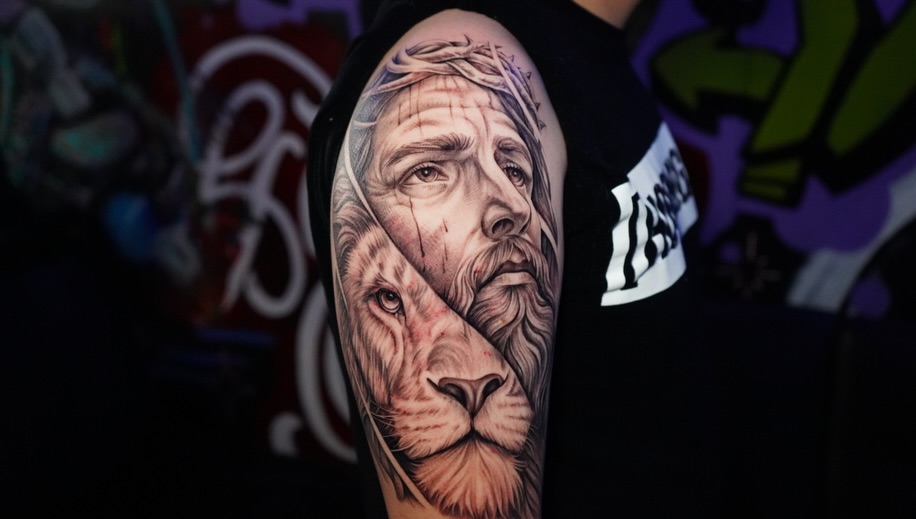 Jesus and lion portrait Chicano tattoo on the forearm by Abel Ponce