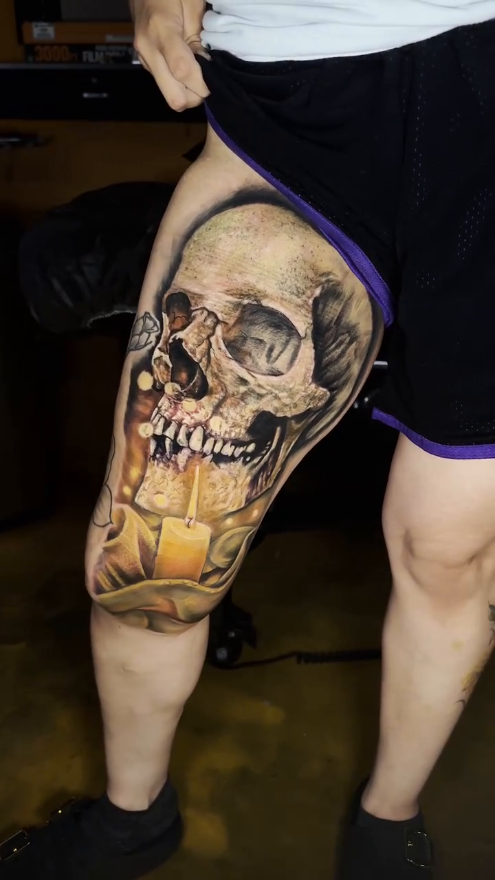 Skull and candle realism tattoo by Joseph Delaparra