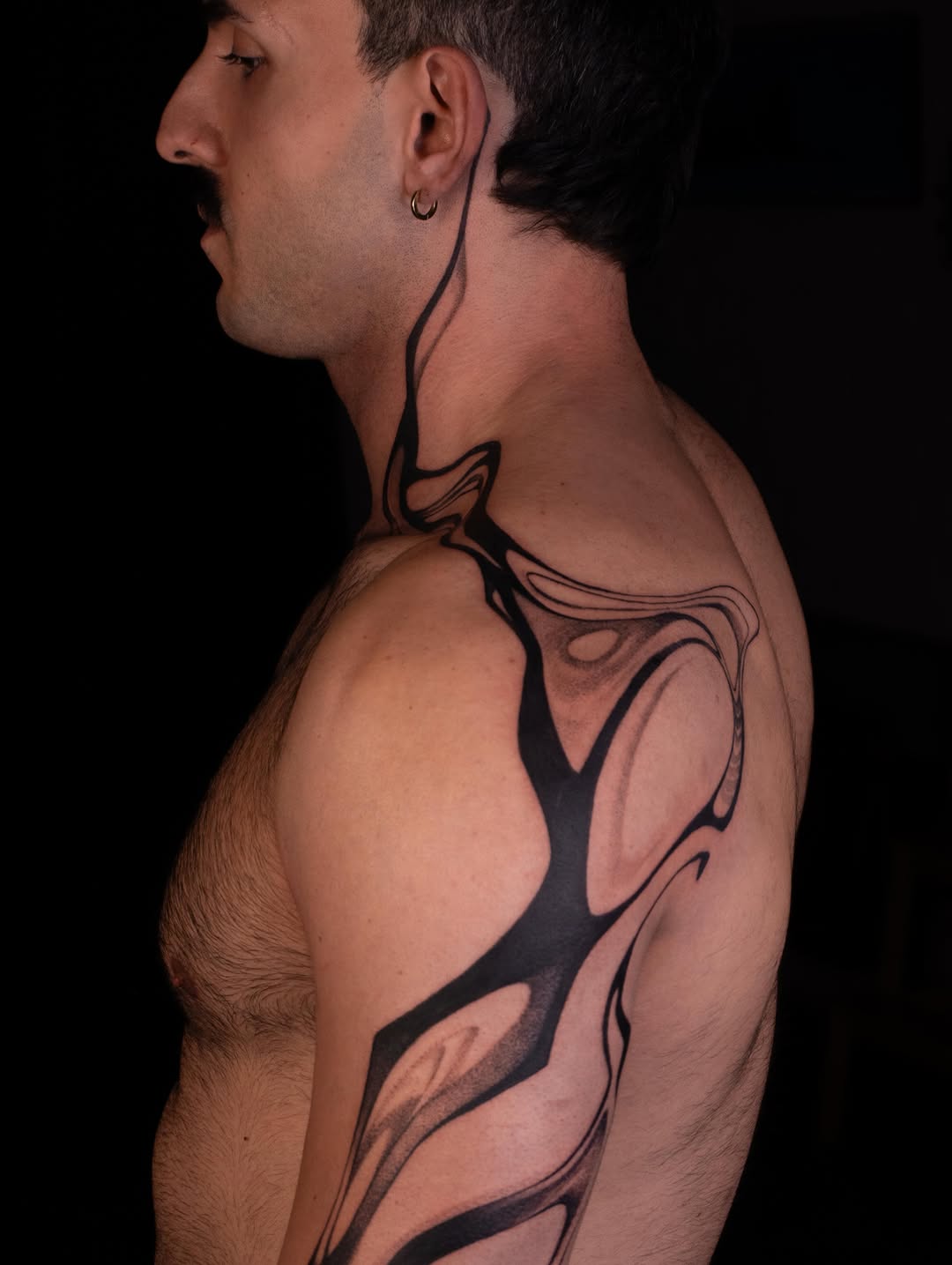 Abstract fluid design cyber sigilism tattoo on the shoulder by Pietro Moleti