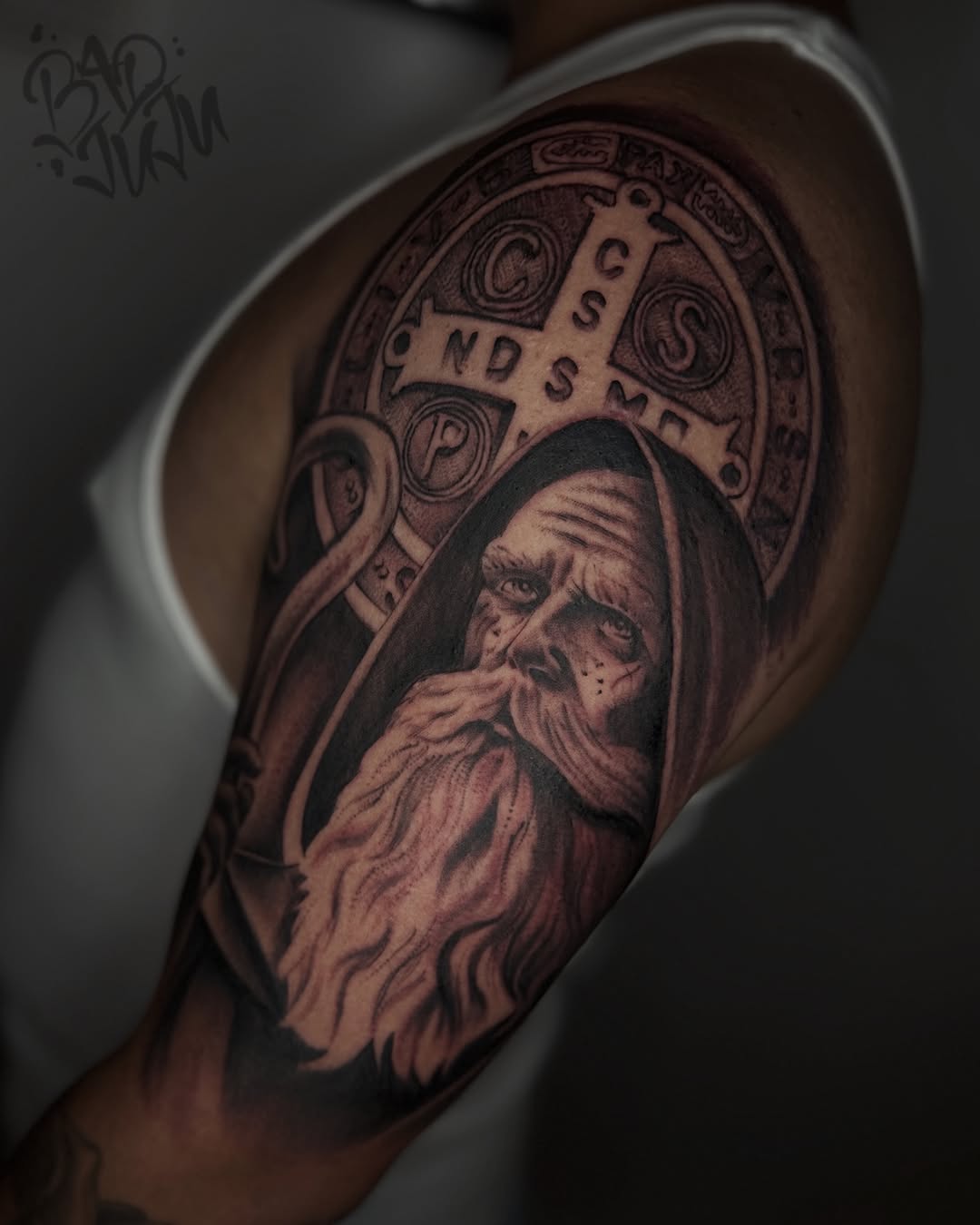 Monk with St. Benedict medal realism tattoo on the forearm by 💞Juju💕