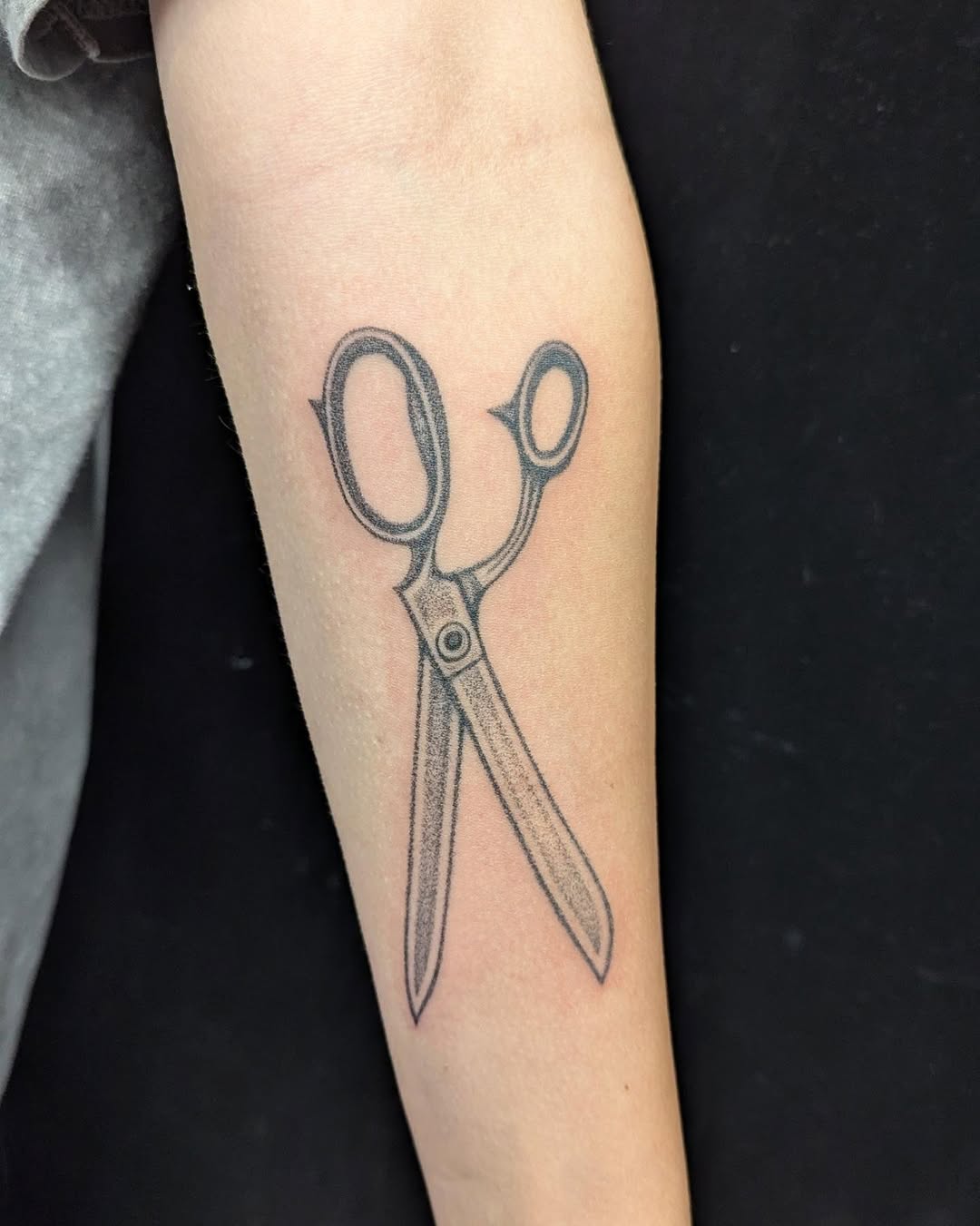 Scissors minimalist tattoo on the forearm by theo, Portland, Oregon