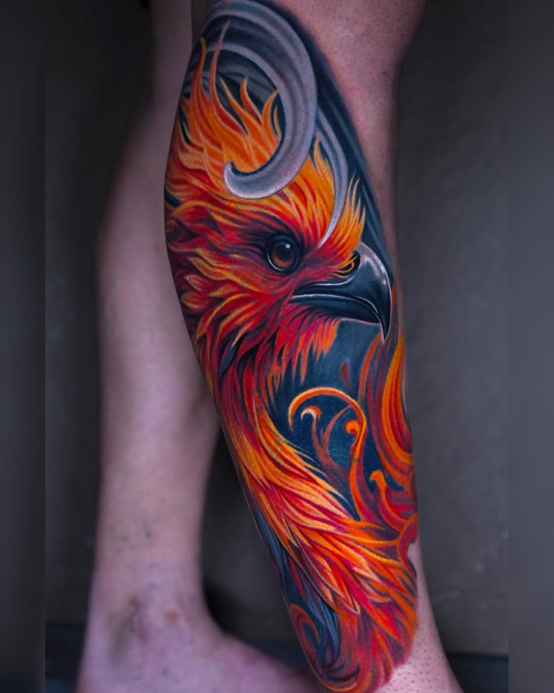 Phoenix head realism tattoo on the forearm by Sadier Alfonso