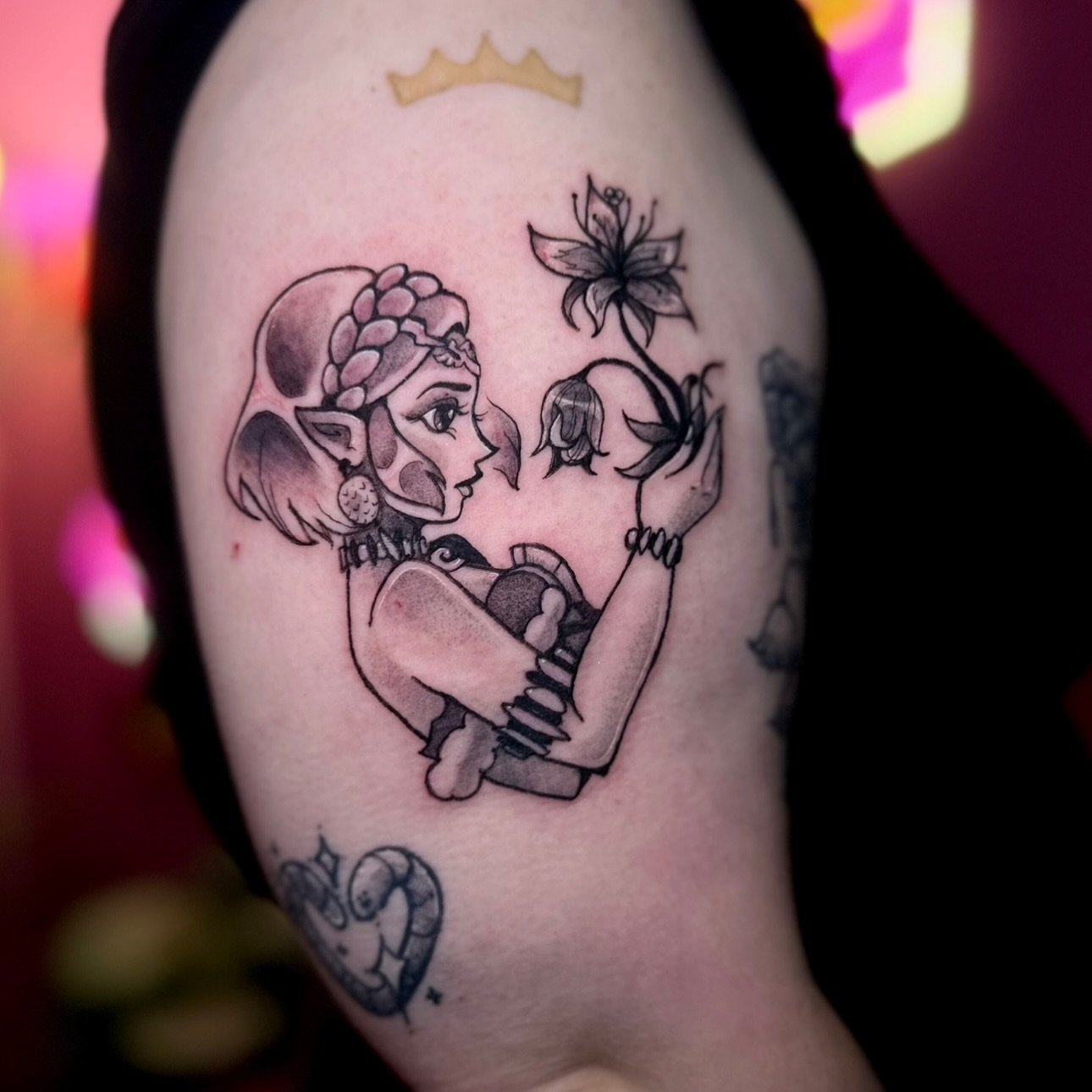 Elf and flower realism tattoo on the upper arm by ⭐️Kelvira⭐️