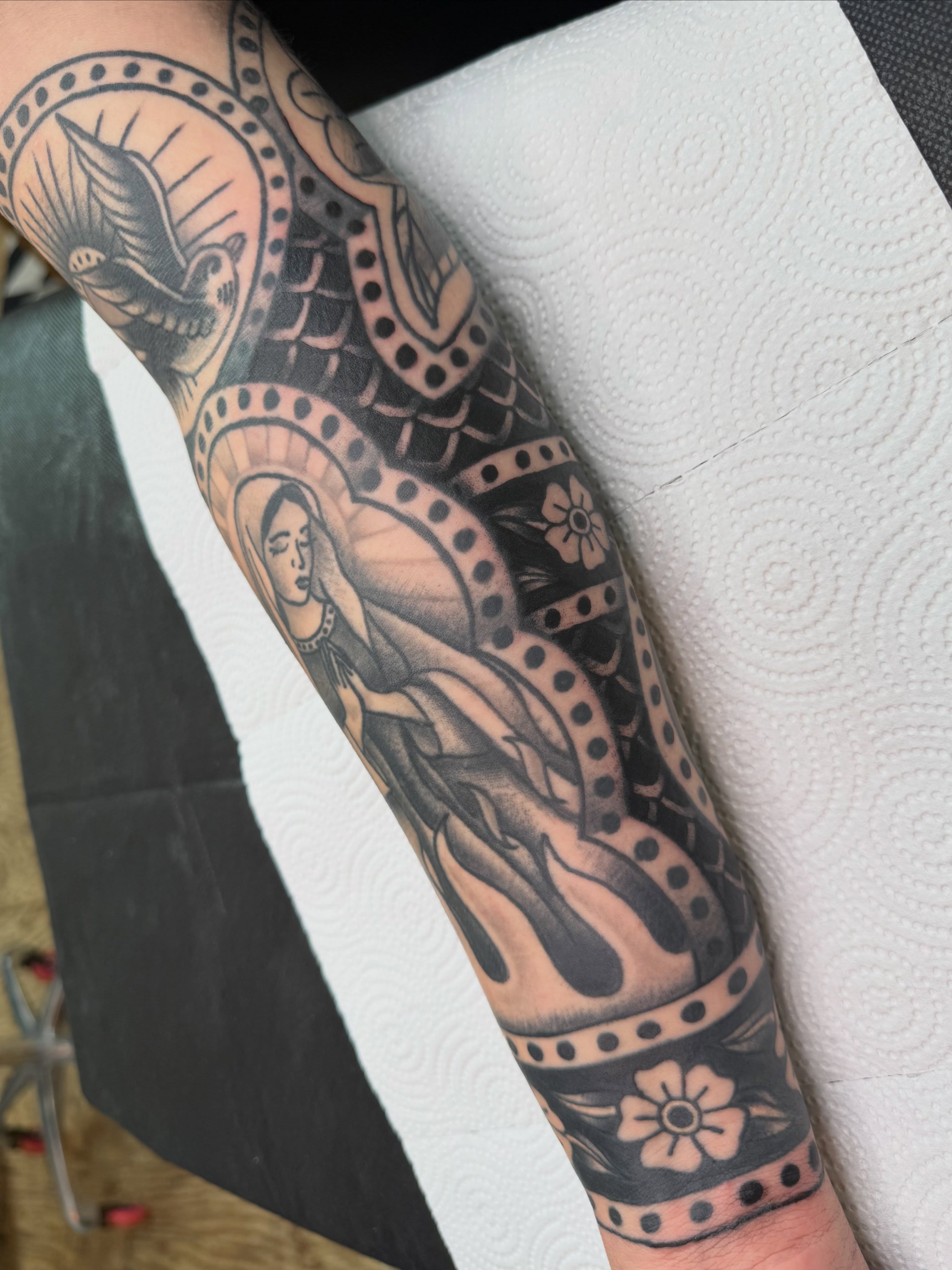 Religious figure American traditional tattoo on the forearm by 🪩 Marisa Rae Mathews 🪩, McKees Rocks, Pennsylvania