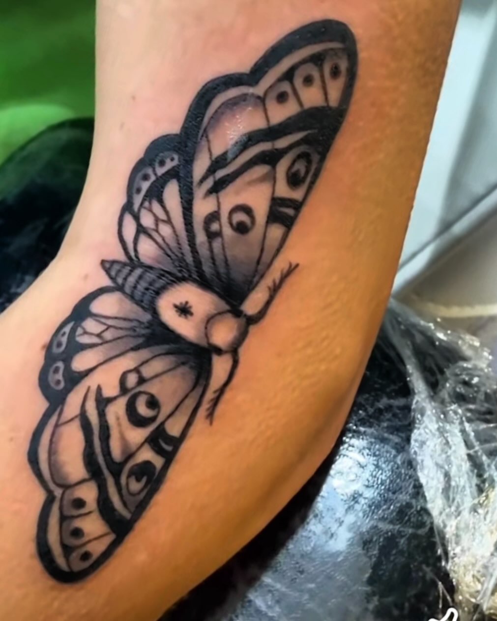 Butterfly fine line tattoo on the forearm by Justin Evans kc ink