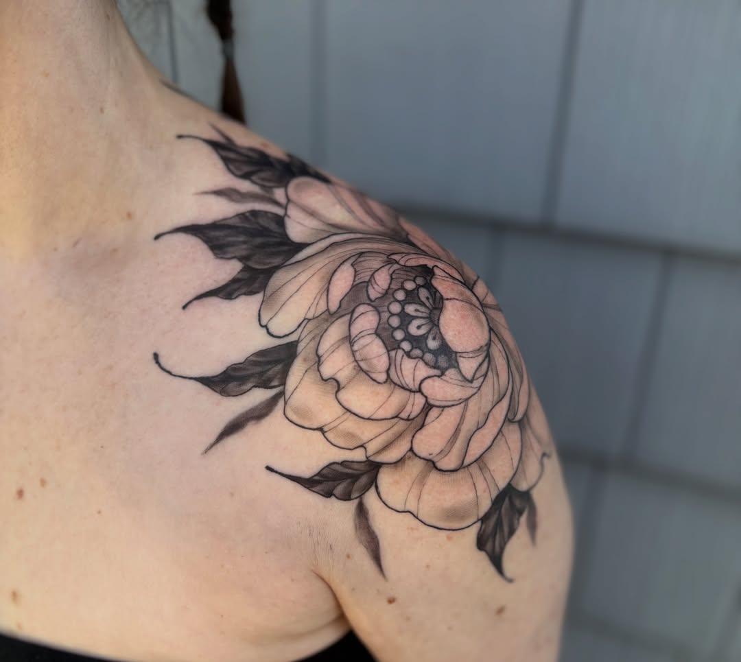 Peony black and grey tattoo on the shoulder by Sarah Lupo, Millbury, Massachusetts