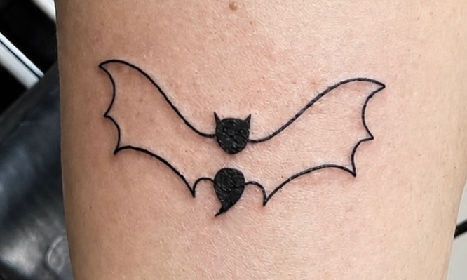 Bat with semicolon fine line tattoo on the forearm by rylie :P