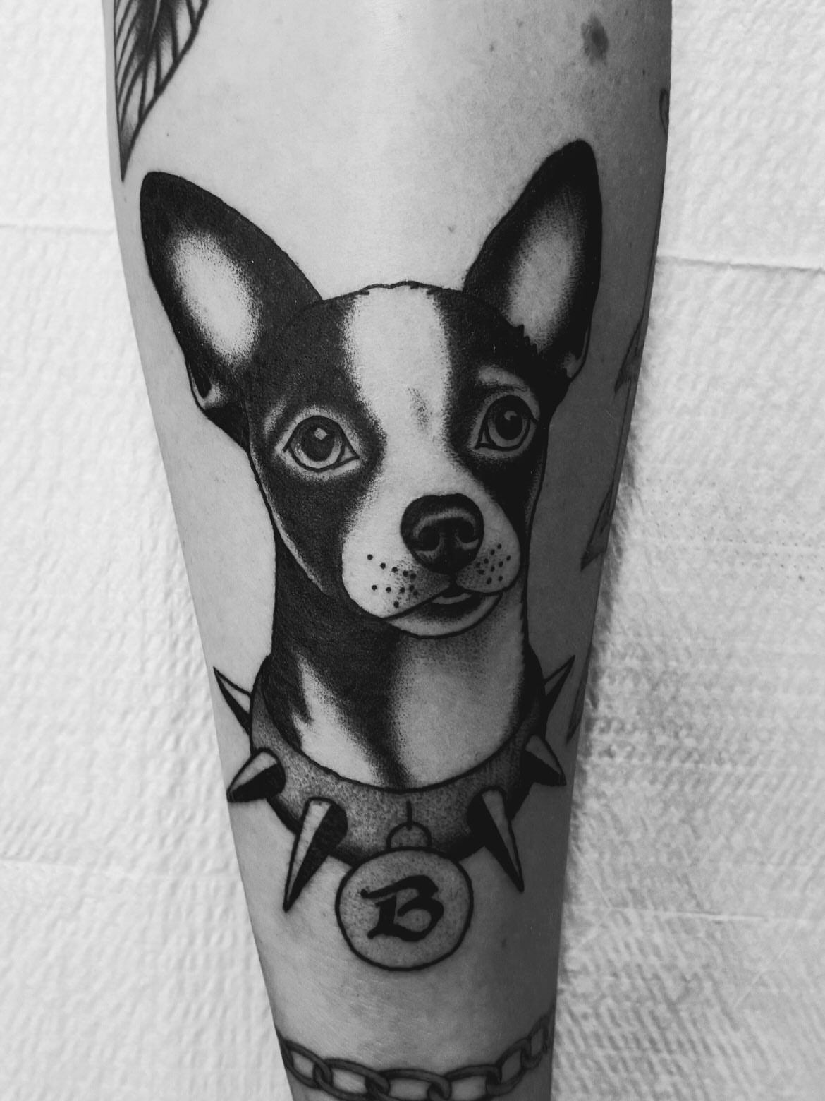 Tattoo by @tennessee_tuck — realism, black_and_grey