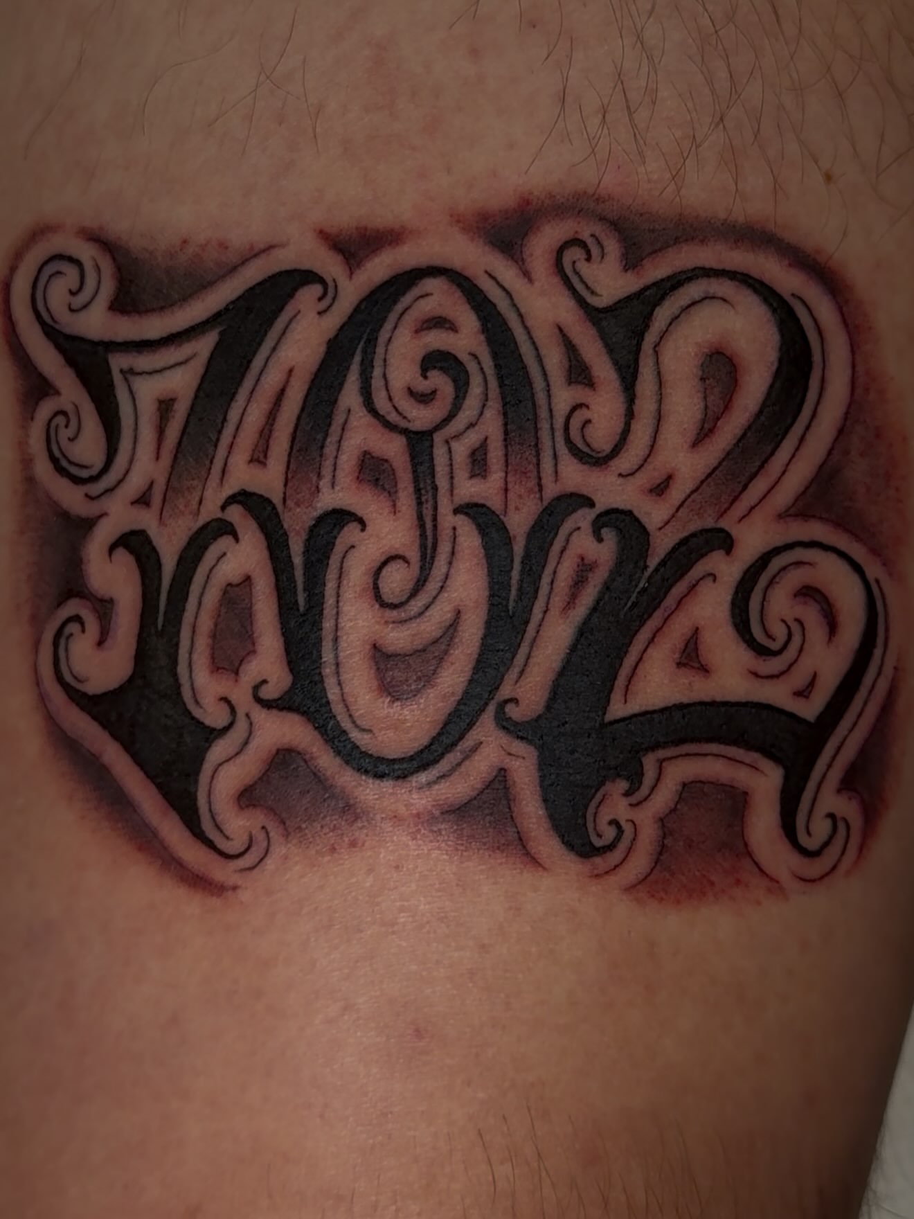 Script lettering lettering script tattoo on the thigh by Las Vegas Tattoo Artist
