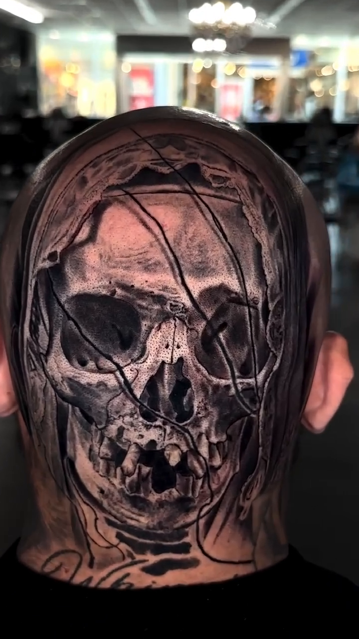 Skull tattoo on head realism tattoo on the head by Jesse White, Mentor, Ohio