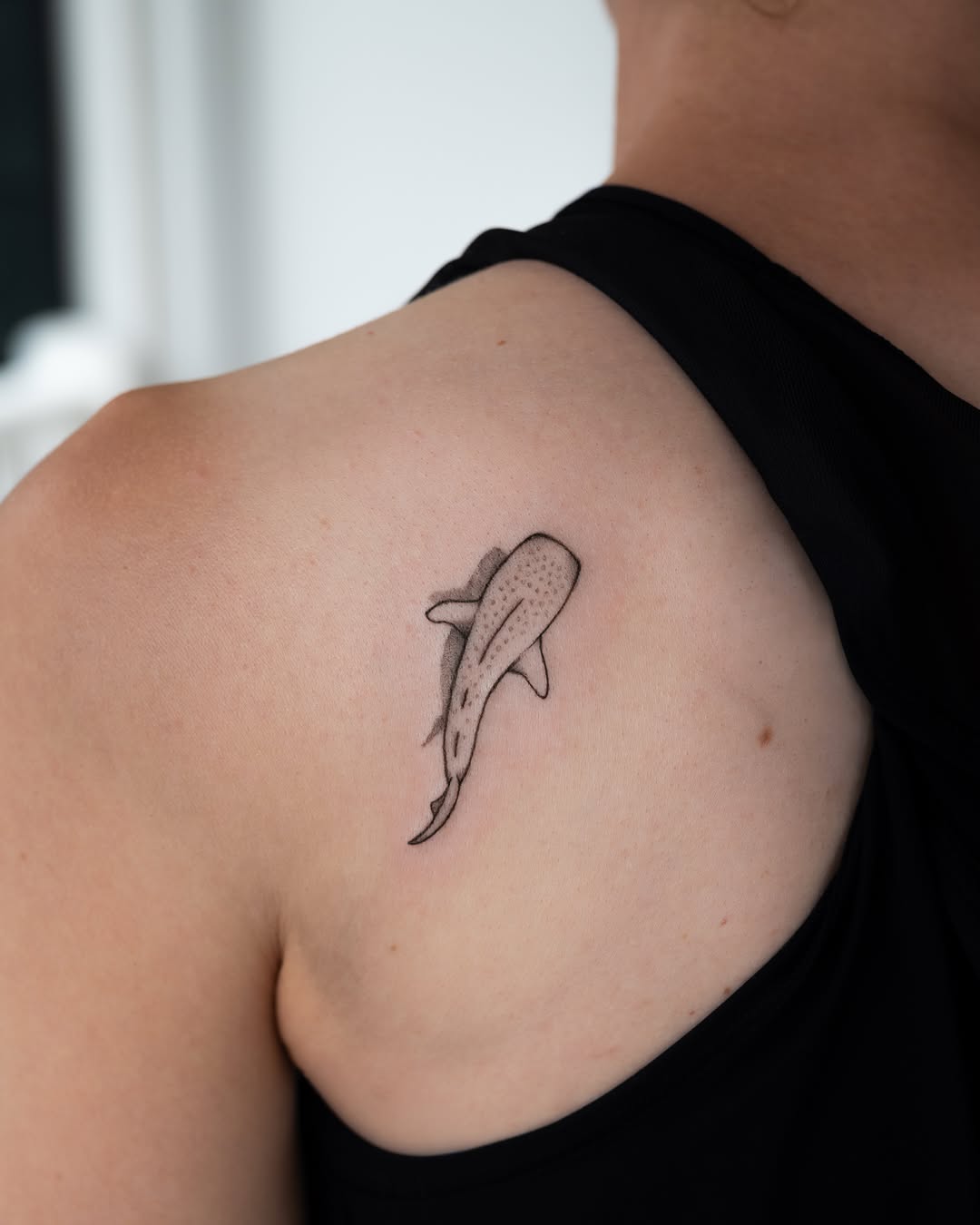 Whale shark fine line tattoo on the shoulder by Ash - Fineline Tattoo Apprentice