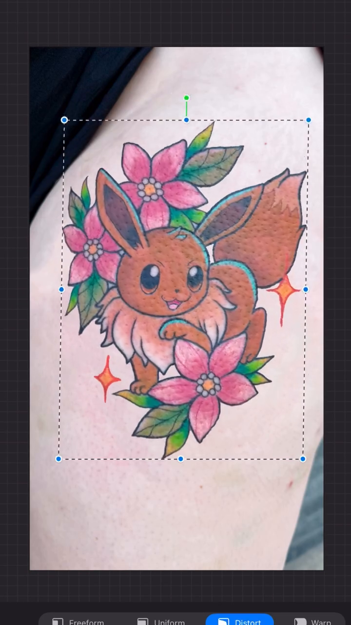Eevee surrounded by flowers tattoo on the forearm by Bri ⚡️✨